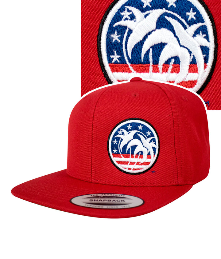 Red snapback hat featuring the NICERIDE Spirit of 76 design embroidered on the front.