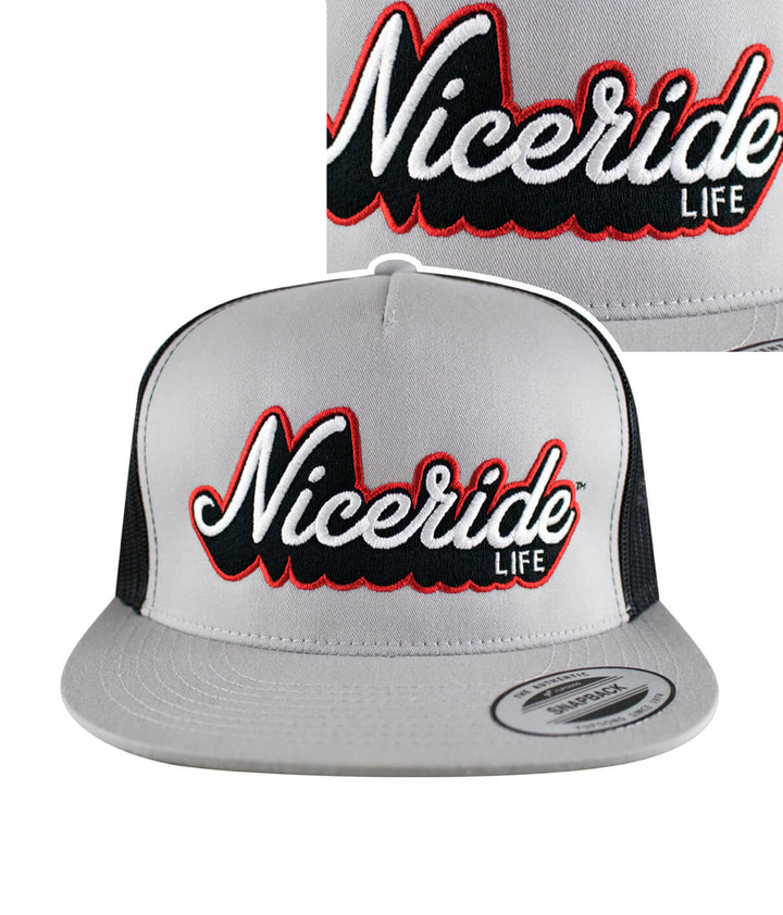 Half Pipe Trucker Hat featuring NICERIDE logo in black and red, showcasing stylish embroidered design.
