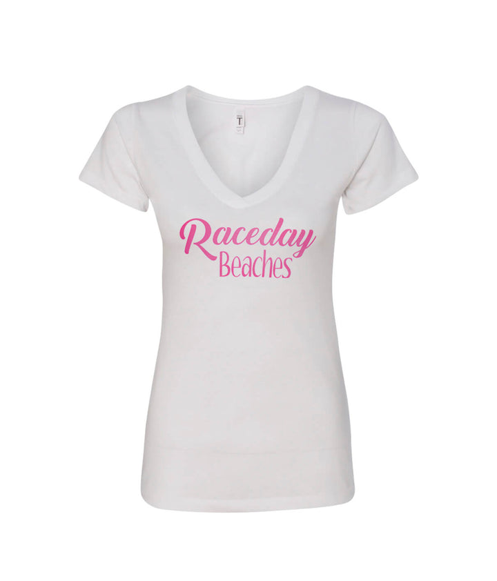 Raceday Beaches V-Neck shirt featuring a pink design on a white background, soft and comfortable for casual wear.