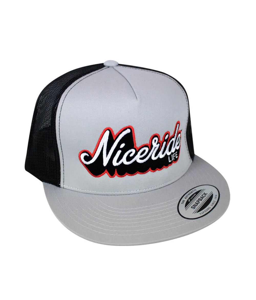 Half Pipe Trucker Hat featuring NICERIDE design, gray and black trucker baseball cap with bold lettering.