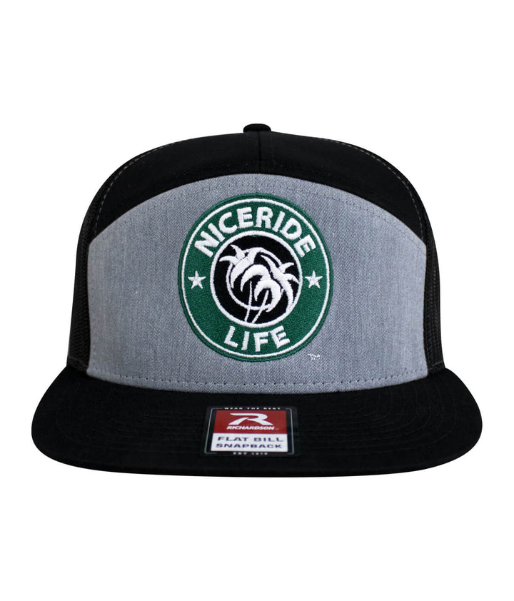 NICERIDE Life Trucker Hat with palm logo, flat bill design, and gray front panel, perfect for outdoor style and comfort.