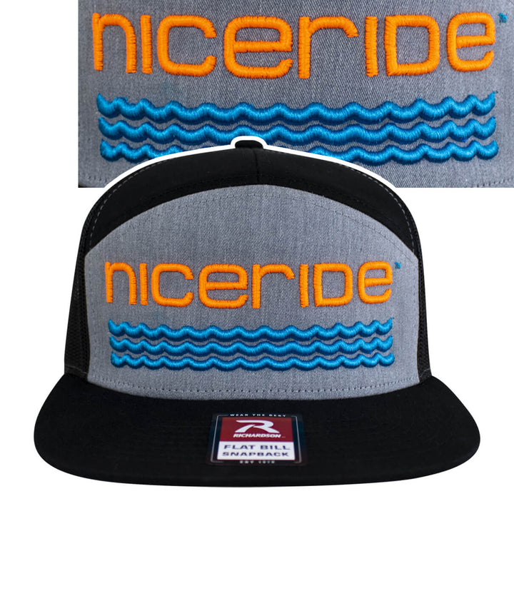 3D center trucker snapback cap featuring NICERIDE logo in neon orange and blue waves embroidery.
