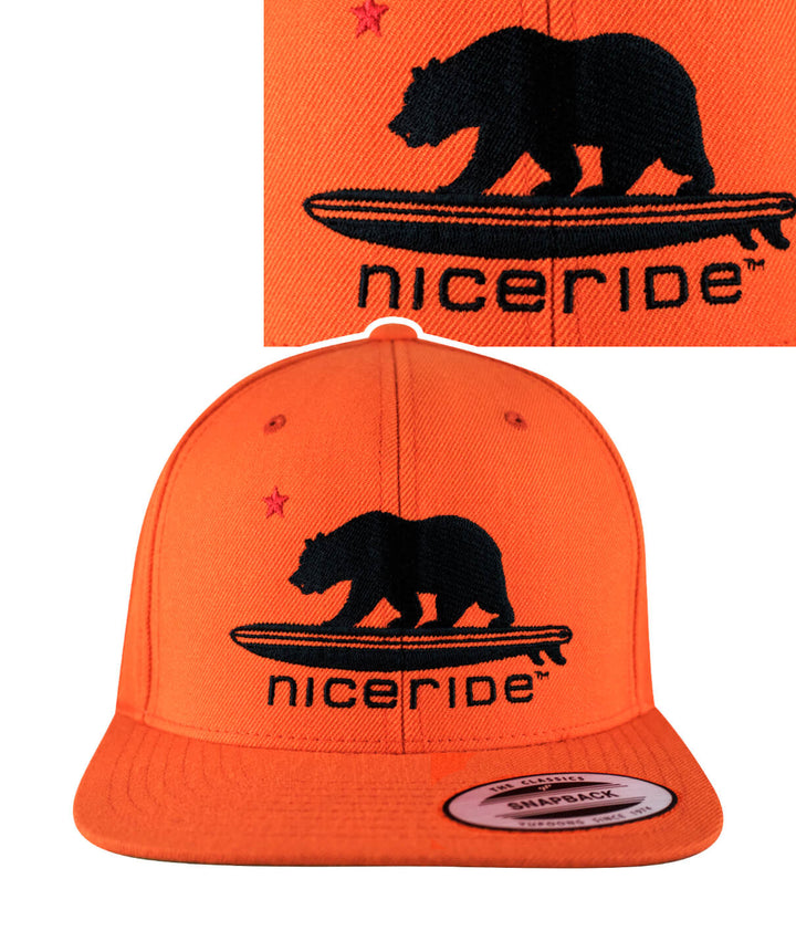 HANG 20 Snapback hat featuring NICERIDE logo and bear design embroidered on an orange background.