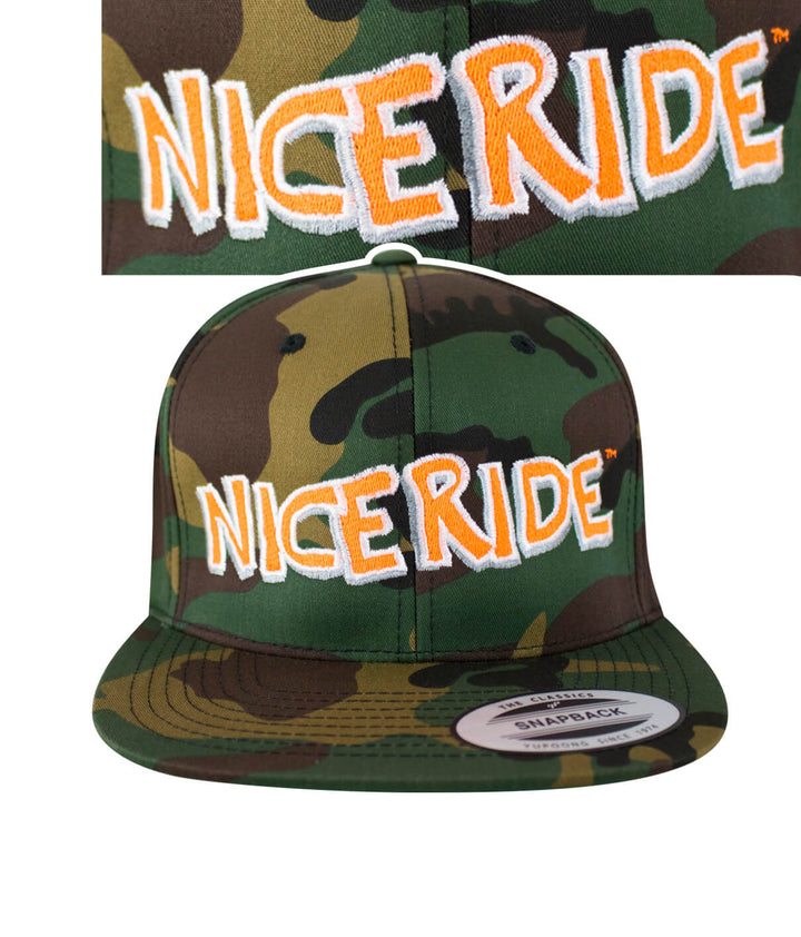 Bed Rock camo snapback hat featuring NICERIDE logo embroidery in orange and green camouflage pattern.