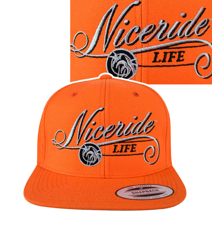The Life snapback hat by NICERIDE featuring orange fabric and stylish embroidered design.