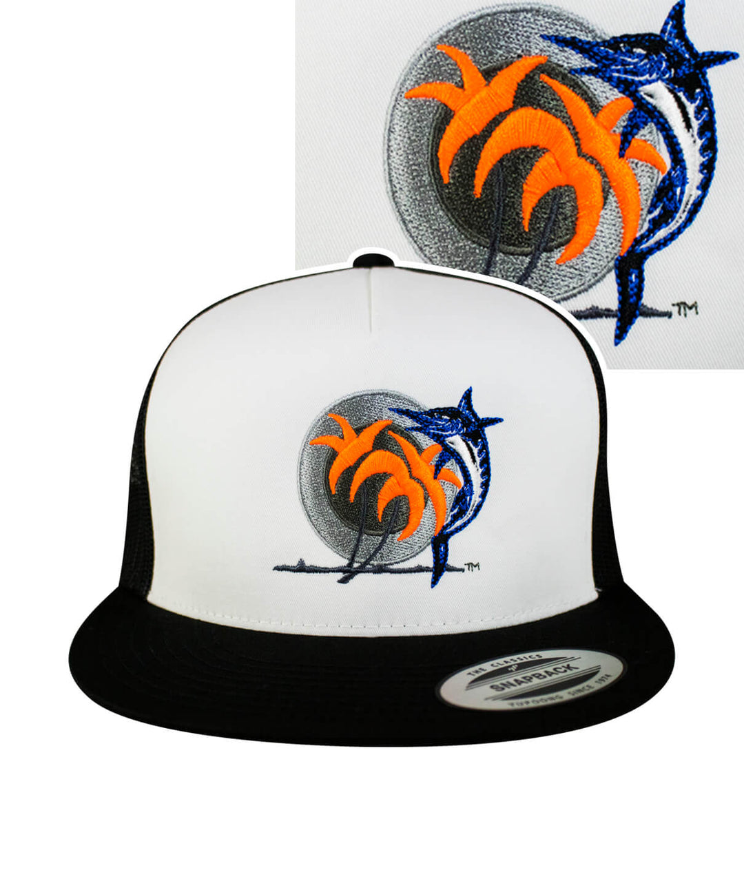 Catch and Release Hat featuring embroidered design of fish and palm trees on a classic snapback trucker hat.