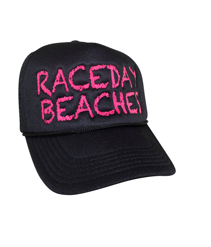 Raceday Beaches Foam Trucker Baseball Cap featuring embroidered text, front view of the hat.