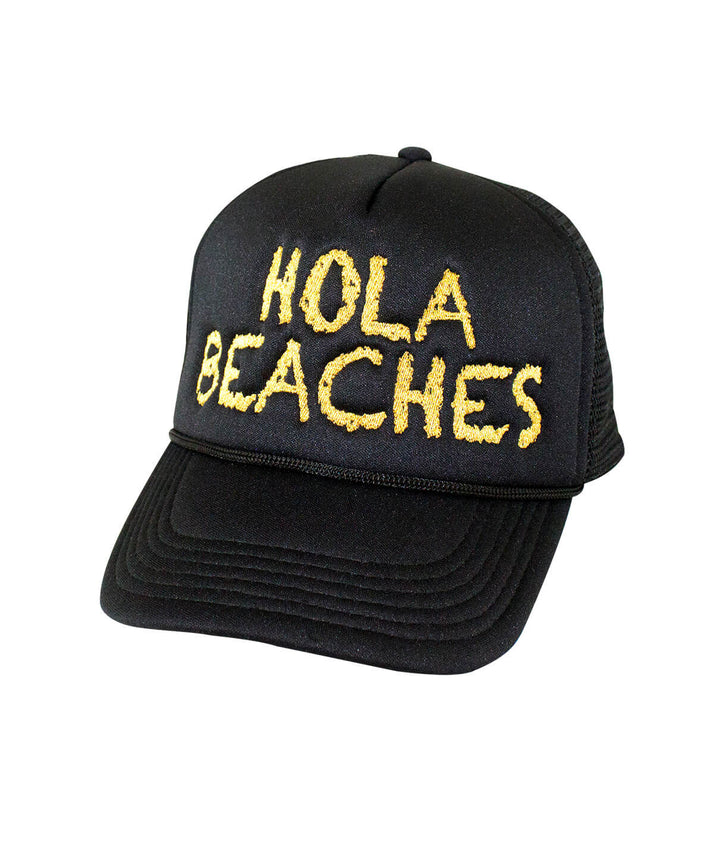 Hola Beaches Foam Trucker Hat featuring embroidered text on the front panel, perfect for a sunny day at the beach.