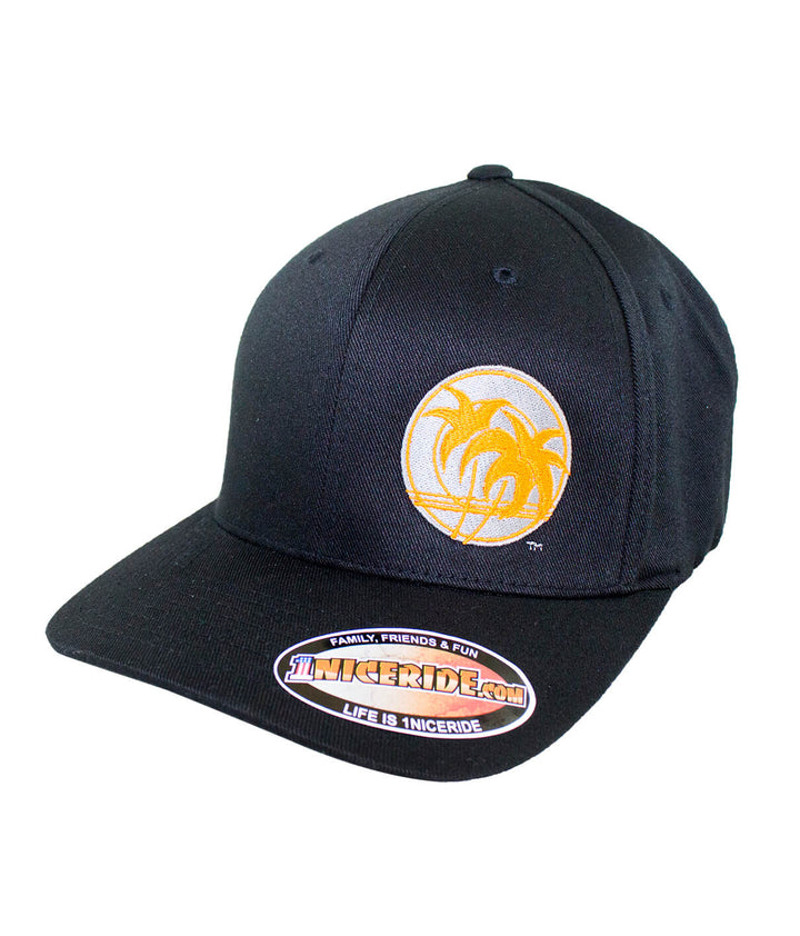 Retro Palm Classic Flexfit Hat featuring embroidered logo and vibrant palm design on a black background.