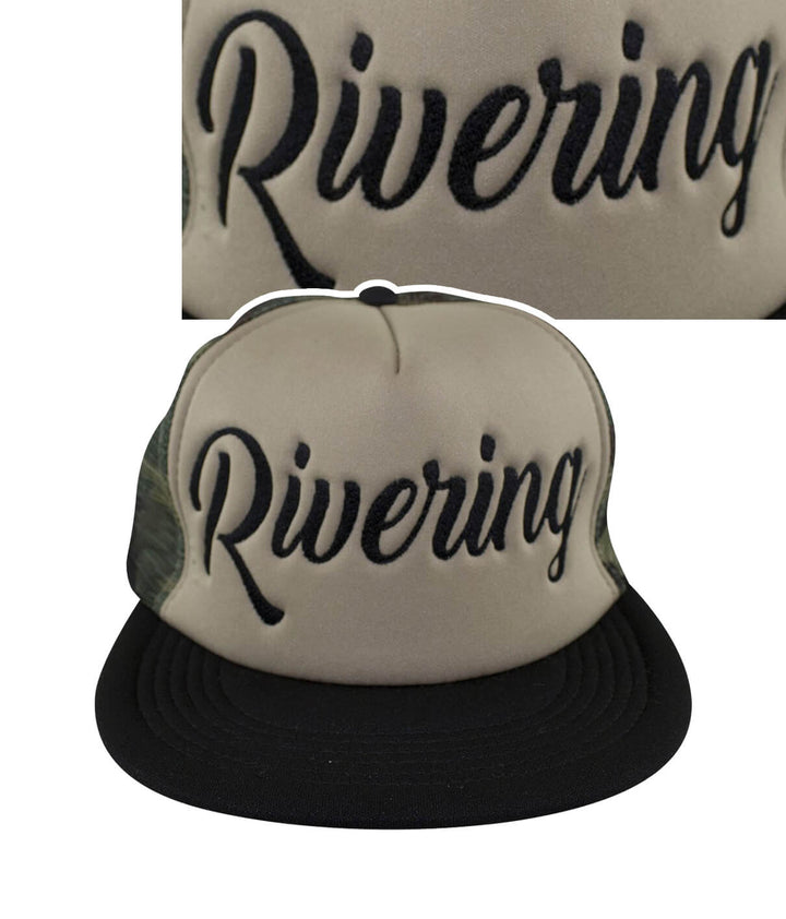 Camo foam trucker hat featuring the embroidered word &